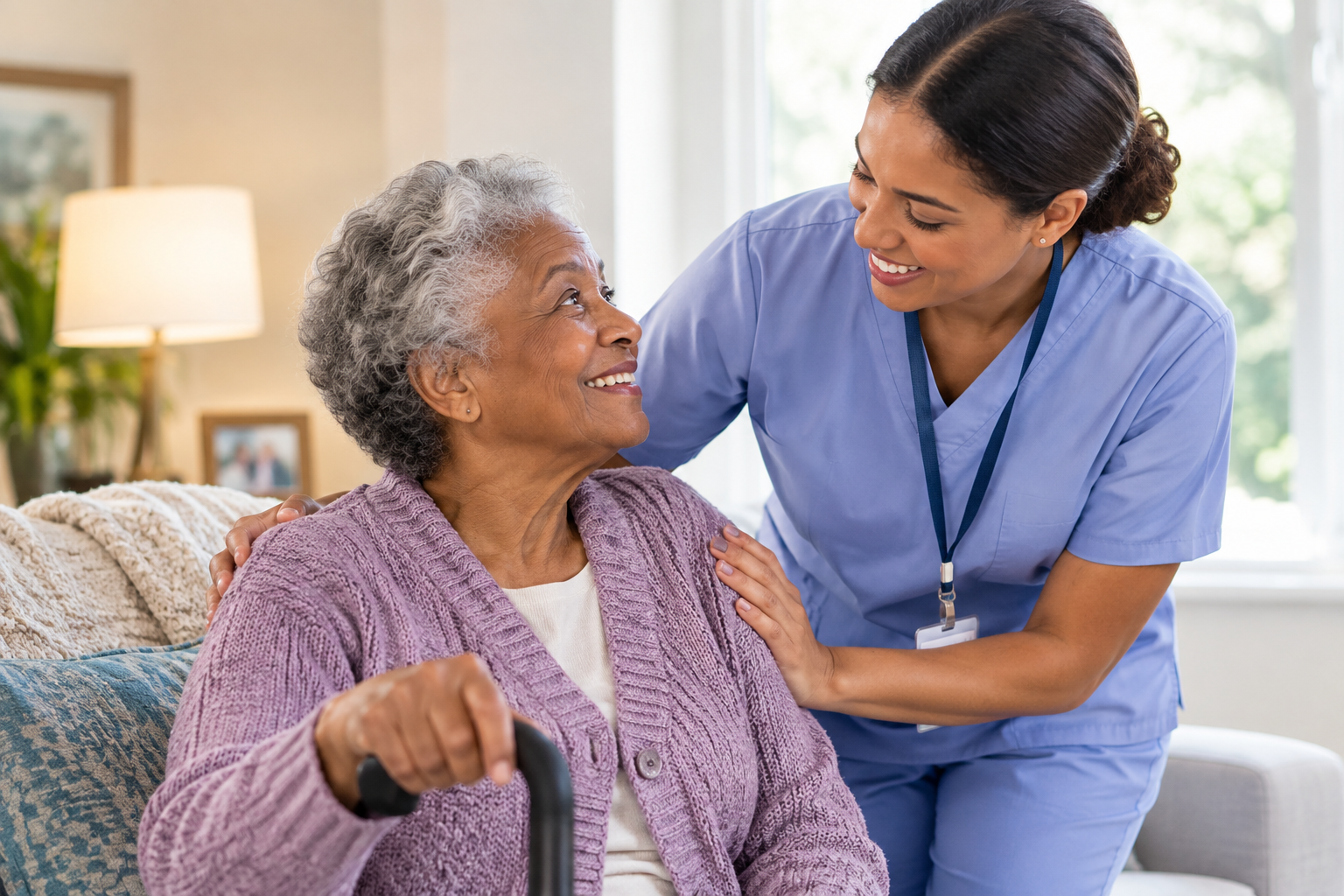 Older adult receiving respectful personal care assistance at home.